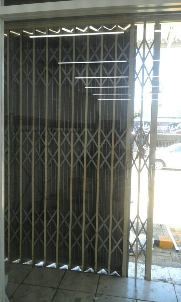 pintu harmonika premium makassar
